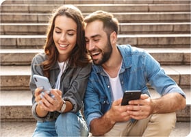 Couple on their phones