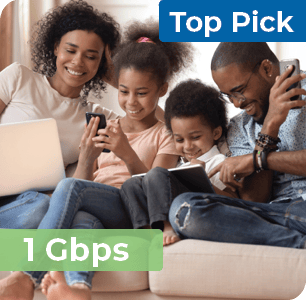 Image says, "Top Pick: 1 gigabit per second" and has a black family all on the couch using different devices including a tablet, two laptops, and a cell phone.