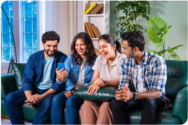 friends on couch on phone