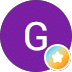 A purple circle with a white capital "G" has a small orange and blue circle with a white star.